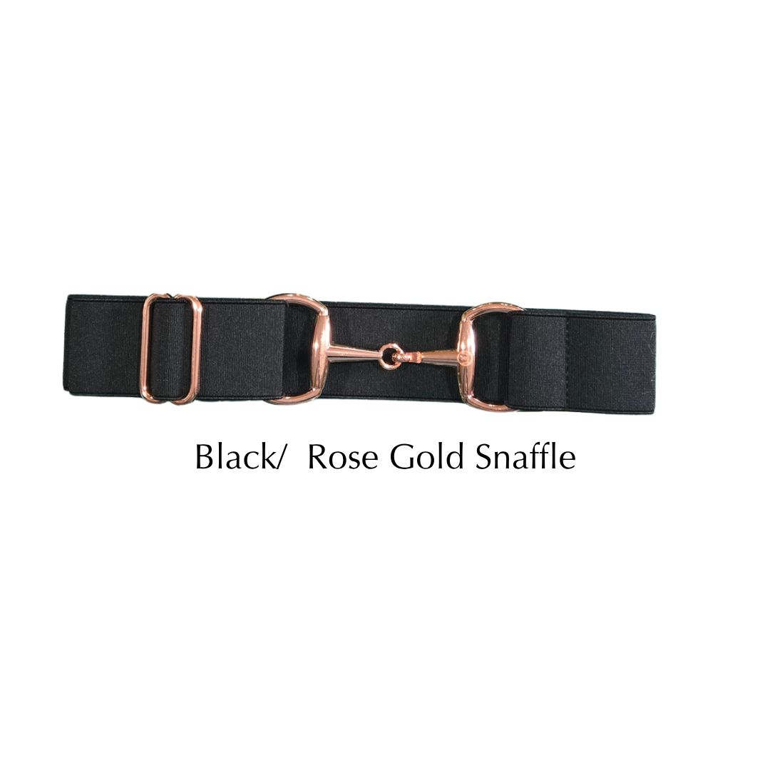 A black elastic horsebit-style snaffle belt with rose gold metal hardware, shown on a plain white background with the text 'Black/ Rose Gold Snaffle' underneath.