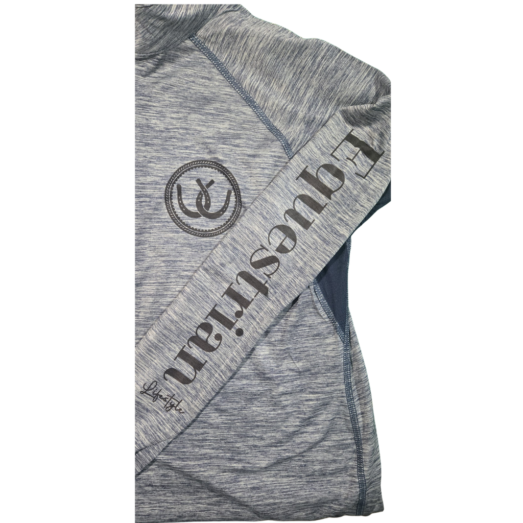 A close-up of a heather gray athletic long-sleeve shirt with a diagonal dark gray 'Equestrian' text overlay and a circular horseshoe logo on the chest, set against a plain white background.