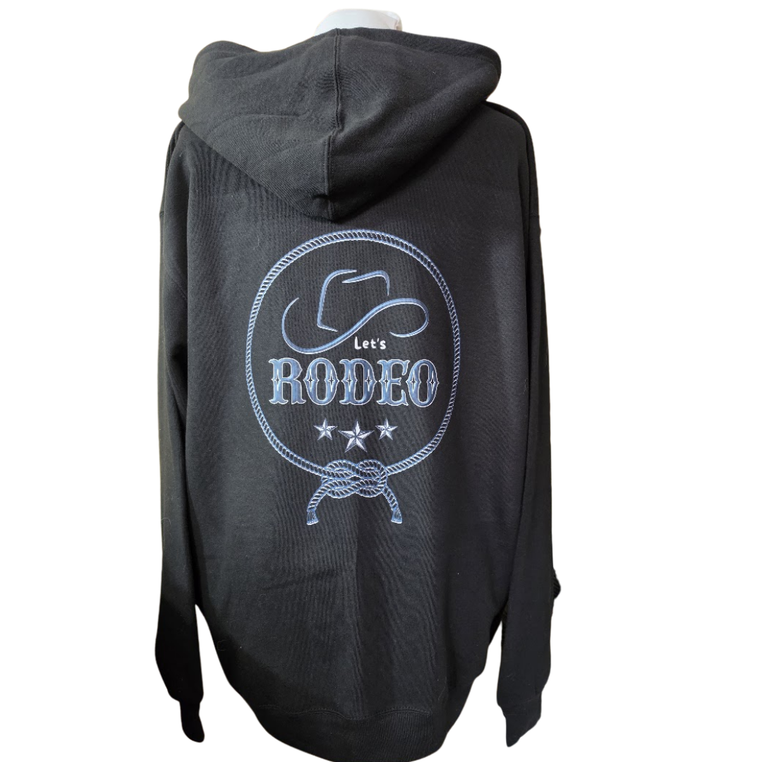 A black hooded sweatshirt shown from the back, featuring a large light blue and white 'Let's RODEO' graphic with a cowboy hat, rope border, and stars.