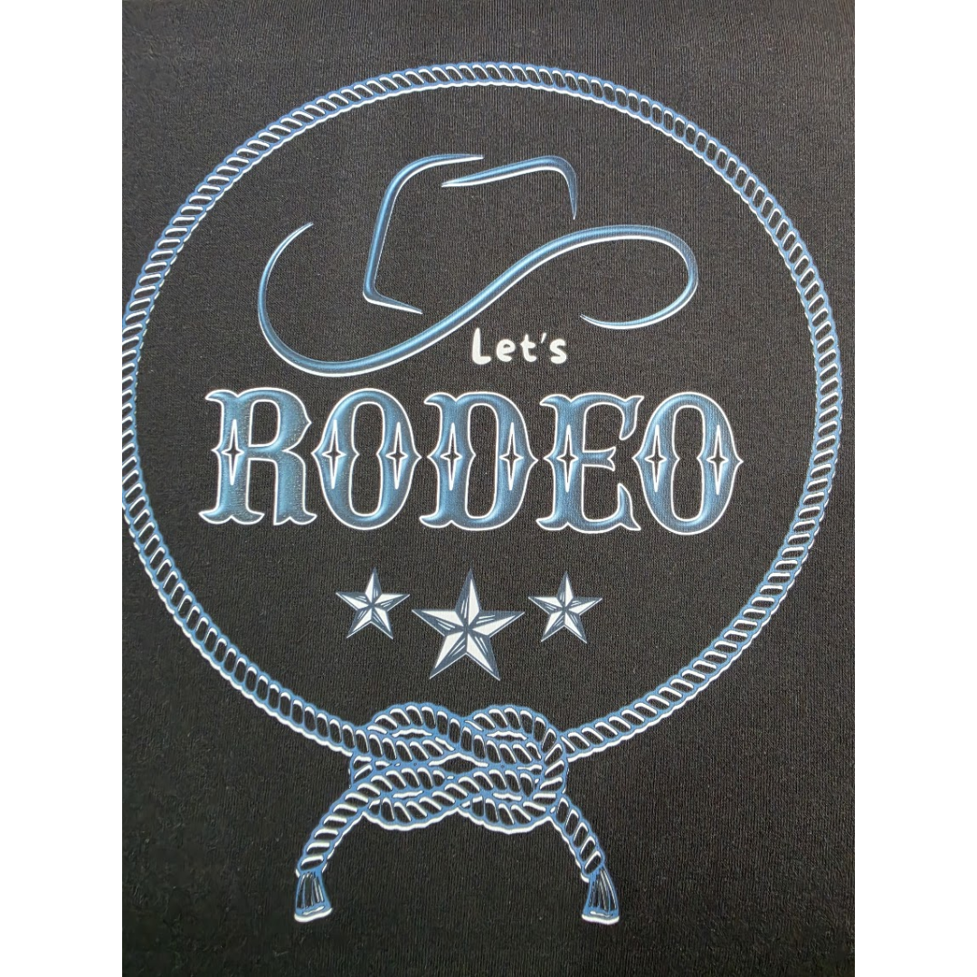 A western-themed graphic design featuring the words 'Let's RODEO' in metallic silver-blue lettering, with a cowboy hat silhouette, rope circle border, three stars, and a tied rope motif on a black background.
