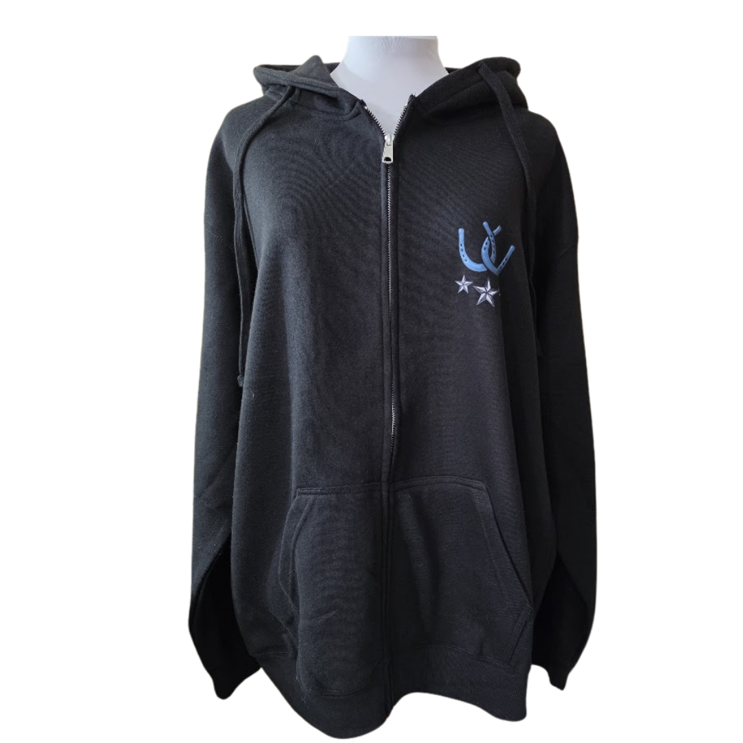 A black zip-up hoodie with a textured knit pattern, featuring a bluehorseshoes and white stars graphic on the left chest, displayed on a mannequin torso against a white background.