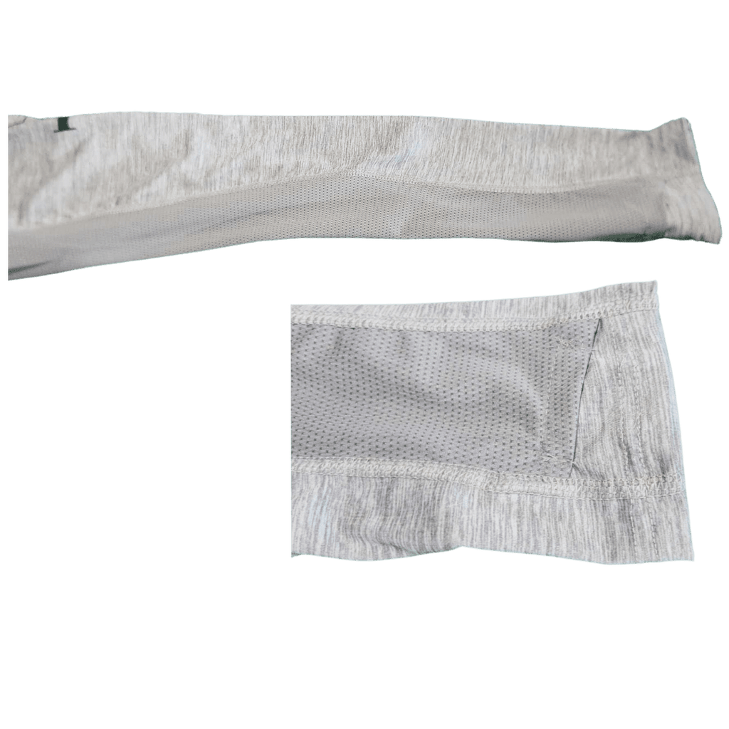A close-up of a light gray athletic sleeve or arm warmer showing both the ribbed knit cuff and the textured mesh fabric, isolated on a white background.