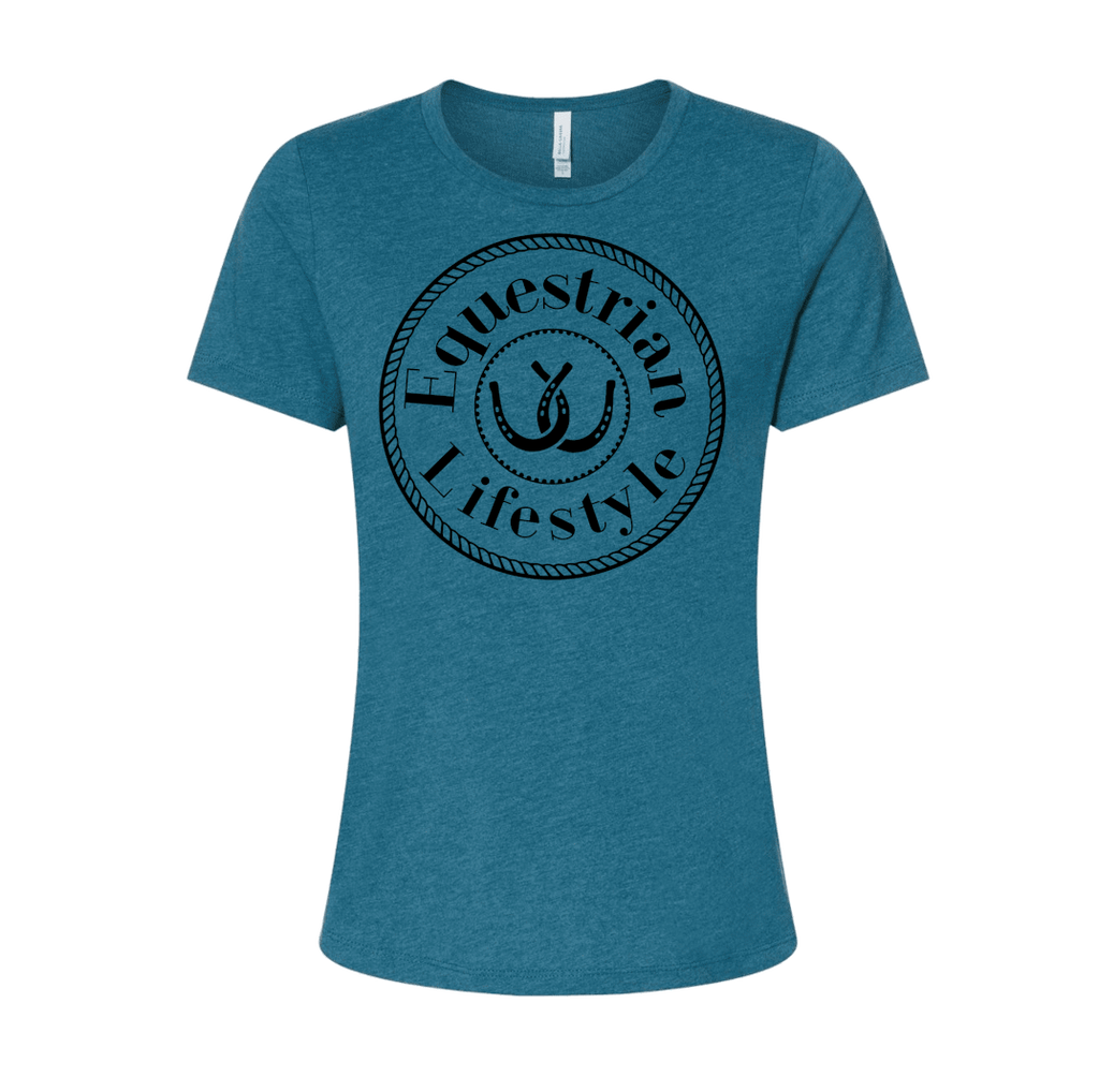 A women's short-sleeve crewneck t-shirt in heather teal blue, featuring a black circular graphic on the chest with the words 'Equestrian Lifestyle' and a horseshoe illustration.