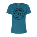 A women's short-sleeve crewneck t-shirt in heather teal blue, featuring a black circular graphic on the chest with the words 'Equestrian Lifestyle' and a horseshoe illustration.