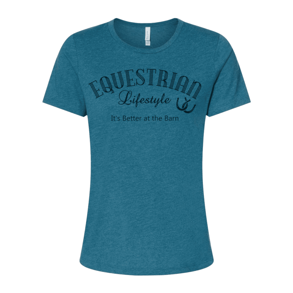 A women's short-sleeve crewneck t-shirt in heathered teal blue, featuring a dark navy graphic print on the front that reads 'EQUESTRIAN Lifestyle It's Better at the Barn' with a horseshoe symbol.