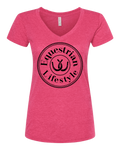 A heather pink women's V-neck t-shirt with a black circular graphic on the chest that reads 'Equestrian Lifestyle' around a horseshoe icon, shown on a plain white background.