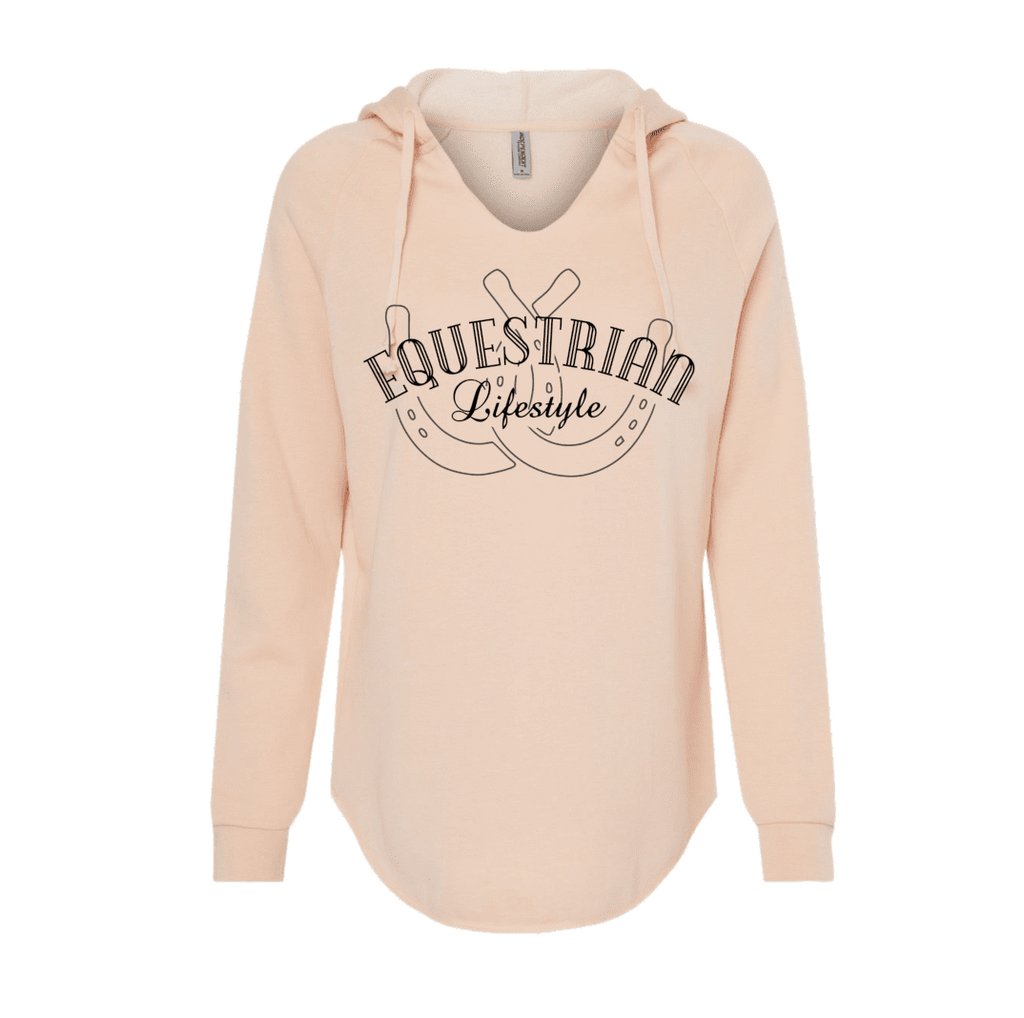 A light peach-colored long-sleeve hoodie with a graphic on the front that reads 'EQUESTRIAN Lifestyle' in brown lettering, featuring  a horseshoe design, shown against a plain white background.