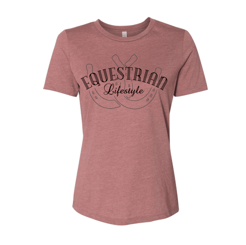 A women's short-sleeve crewneck t-shirt in heathered dusty rose pink, featuring a dark brown graphic on the chest with the words 'EQUESTRIAN Lifestyle' and a horseshoe design.