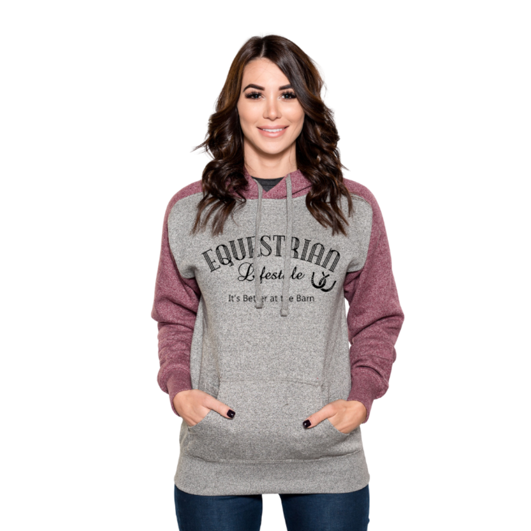 A woman modeling a heather gray and maroon raglan hoodie with 'EQUESTRIAN Lifestyle and Its better at the barn' printed on the front, set against a plain white background.