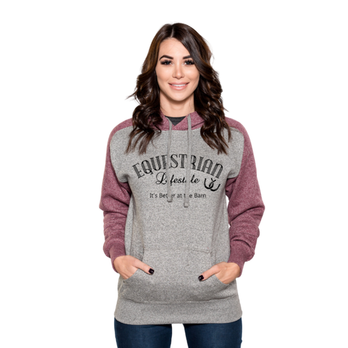 A woman modeling a heather gray and maroon raglan hoodie with 'EQUESTRIAN Lifestyle and Its better at the barn' printed on the front, set against a plain white background.