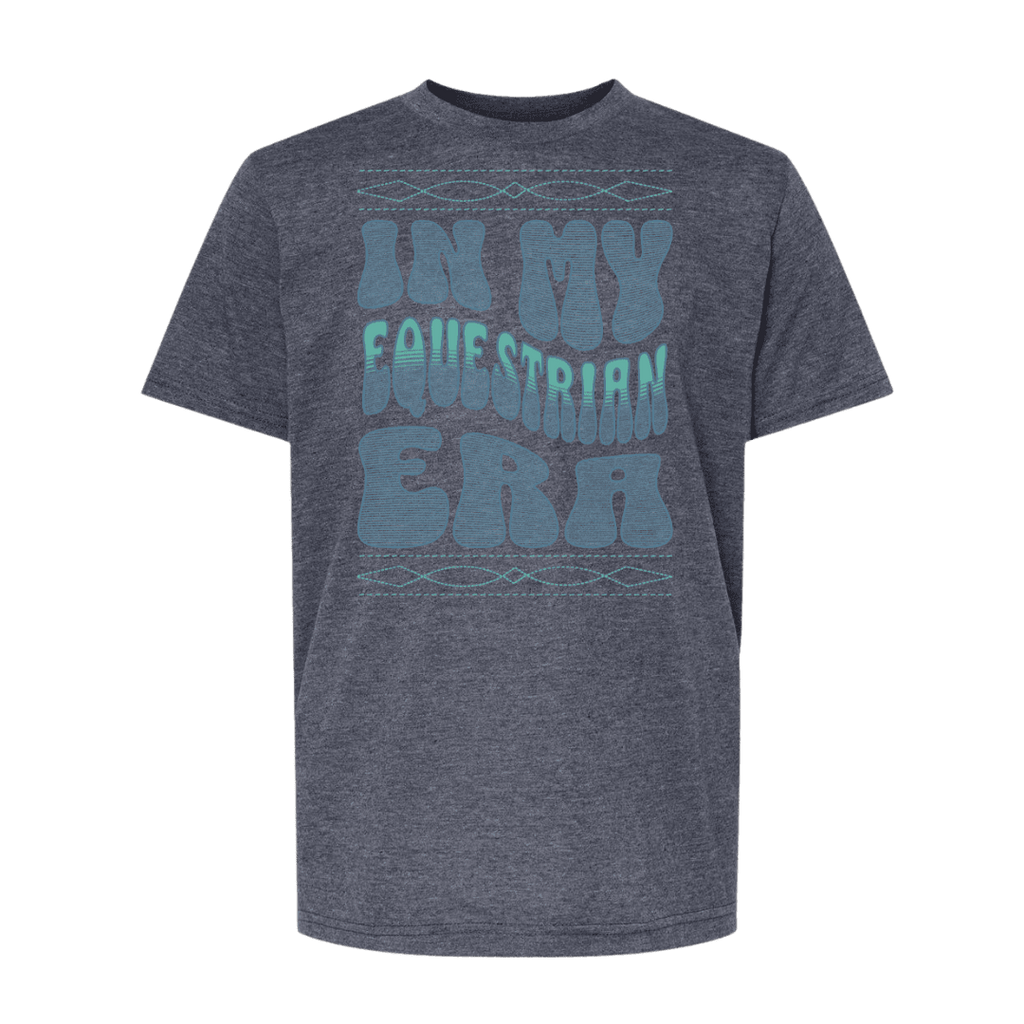 A heather dark gray crewneck t-shirt featuring a retro-style graphic that reads 'IN MY EQUESTRIAN ERA' in light blue and teal lettering, with decorative stitched pattern borders above and below.