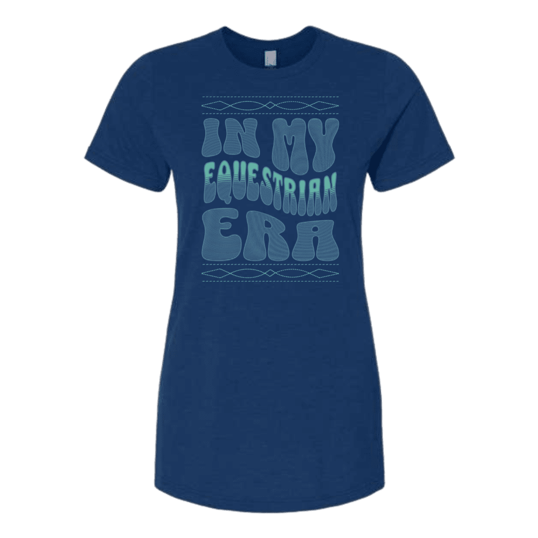 A navy blue short-sleeve t-shirt with a light blue graphic text print reading 'IN MY EQUESTRIAN ERA' on the front, displayed against a solid white background.