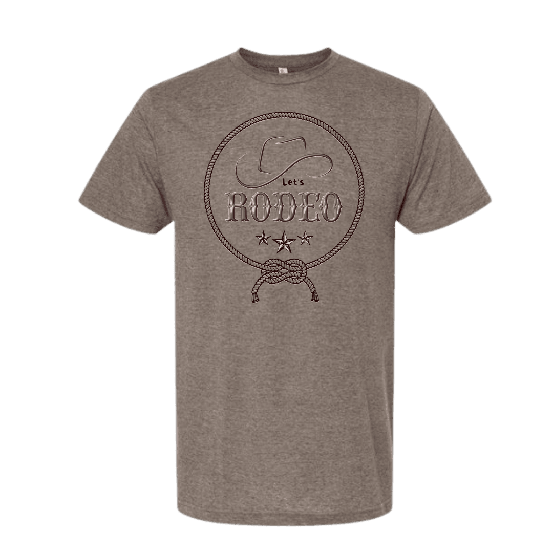 A heather gray short-sleeve crewneck t-shirt featuring a dark brown graphic on the chest with a cowboy hat, rope, stars, and the text 'Lets rodeo.