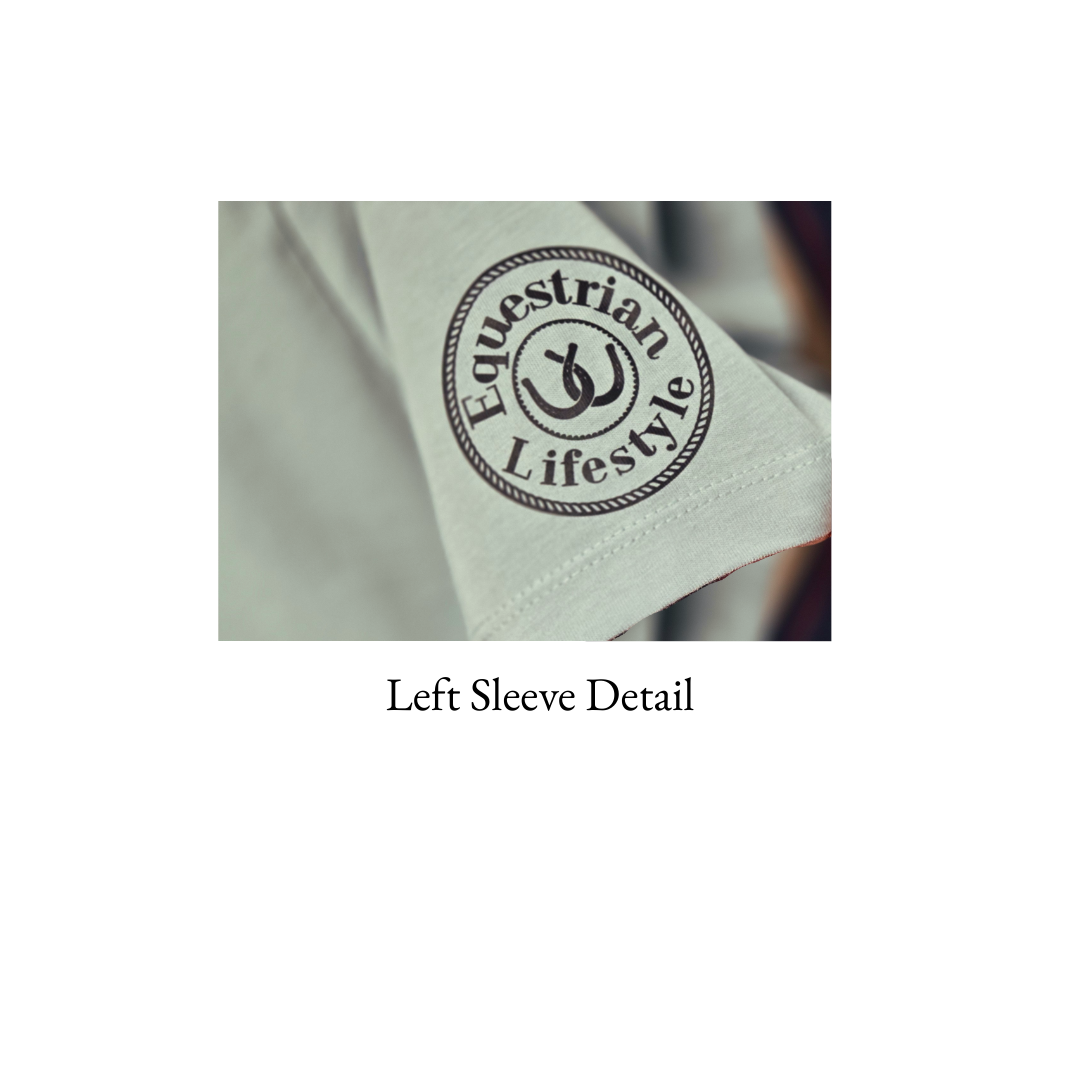 Close-up of a light gray sleeve with a circular embroidered logo reading 'Equestrian Lifestyle' in dark gray/black thread, with the text 'Left Sleeve Detail' below on a white background.