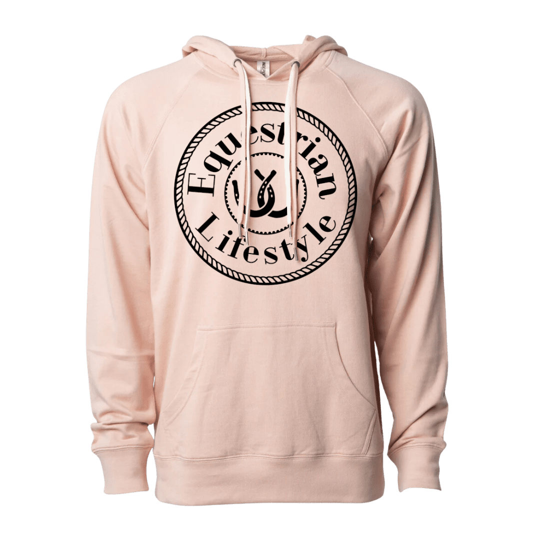 A light peach-pink pullover hoodie with a black circular graphic on the chest reading 'Equestrian Lifestyle' around a horseshoe, shown on a plain white background.